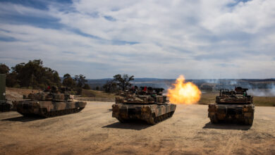 Australian Army Abrams M1A2 SEPv3 Main Battle Tanks during a live-fire serial as part of a qualification course for Royal Australian Armoured Corps soldiers at Puckapunyal Military Area, Victoria. *** Local Caption *** Armys combined arms fighting system will be modernised through the delivery of LAND 907. LAND 907 will deliver M1A2 Abrams System Enhancement Package version 3 (SEPv3) main battle tanks (MBTs). LAND 907 will also deliver the assault breacher vehicle (ABV) and joint assault bridge (JAB) collectively known as the combat engineering vehicles (CEV). The MBT and CEV are manufactured in the United States of America in Alabama, Ohio and Missouri before being shipped to Australia from Southern California. The initial block of MBT, comprising 27 vehicles, departed the US in late June and arrived in Australia in August 2024. The initial block of CEV will also be shipped to Australia, arriving in early 2025. The MBT and CEV will be located in Townsville as part of the 2nd Cavalry Regiment, 3rd Brigade, with small fleets located in Puckapunyal and Wodonga, in accordance with the outcomes of the 2024 National Defence Strategy.