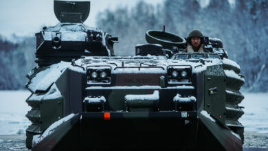 U.S. Marines with Marine Rotational Force-Europe 21.1, Marine Forces Europe and Africa, conduct a safety of use memorandum (SOUM) on an assault amphibious vehicle (AAV) in preparation for Exercise Reindeer II, Reindeer I, and Joint Viking in Setermoen, Norway, Nov. 19, 2020. The SOUM test assessed the watertight integrity of AAV’s hull on a submerged ramp and is part of a continuing effort to ensure the equipment is safe. (U.S. Marine Corps photo by Cpl. William Chockey)