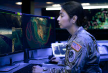 U.S. Space Force 1st Lt. Tia Scoggan, weapons and tactics section chief for the 18th Space Defense Squadron Det. 1, looks at a computer screen at Schriever Space Force Base, Colorado, Oct. 5, 2022. 18 SDS Det. 1 provides timely and actionable Space Domain Awareness (SDA) for emergent and existing threats that are identified by the Joint Task Force-Space Defense’s National Space Defense Center as on-orbit threats. (U.S. Space Force photo by Tiana Williams)