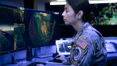 U.S. Space Force 1st Lt. Tia Scoggan, weapons and tactics section chief for the 18th Space Defense Squadron Det. 1, looks at a computer screen at Schriever Space Force Base, Colorado, Oct. 5, 2022. 18 SDS Det. 1 provides timely and actionable Space Domain Awareness (SDA) for emergent and existing threats that are identified by the Joint Task Force-Space Defense’s National Space Defense Center as on-orbit threats. (U.S. Space Force photo by Tiana Williams)