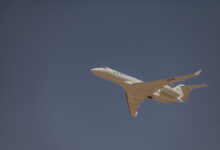 A U.S. Air Force E-11A Aircraft equipped with the Battlefield Airborne Communications Node flies over an undisclosed location within the U.S. Central Command area of responsibility, May 7, 2024. BACN was originally developed to extend communications and data range for military operations in the mountainous terrain near and around Afghanistan. (U.S. Air Force photo)