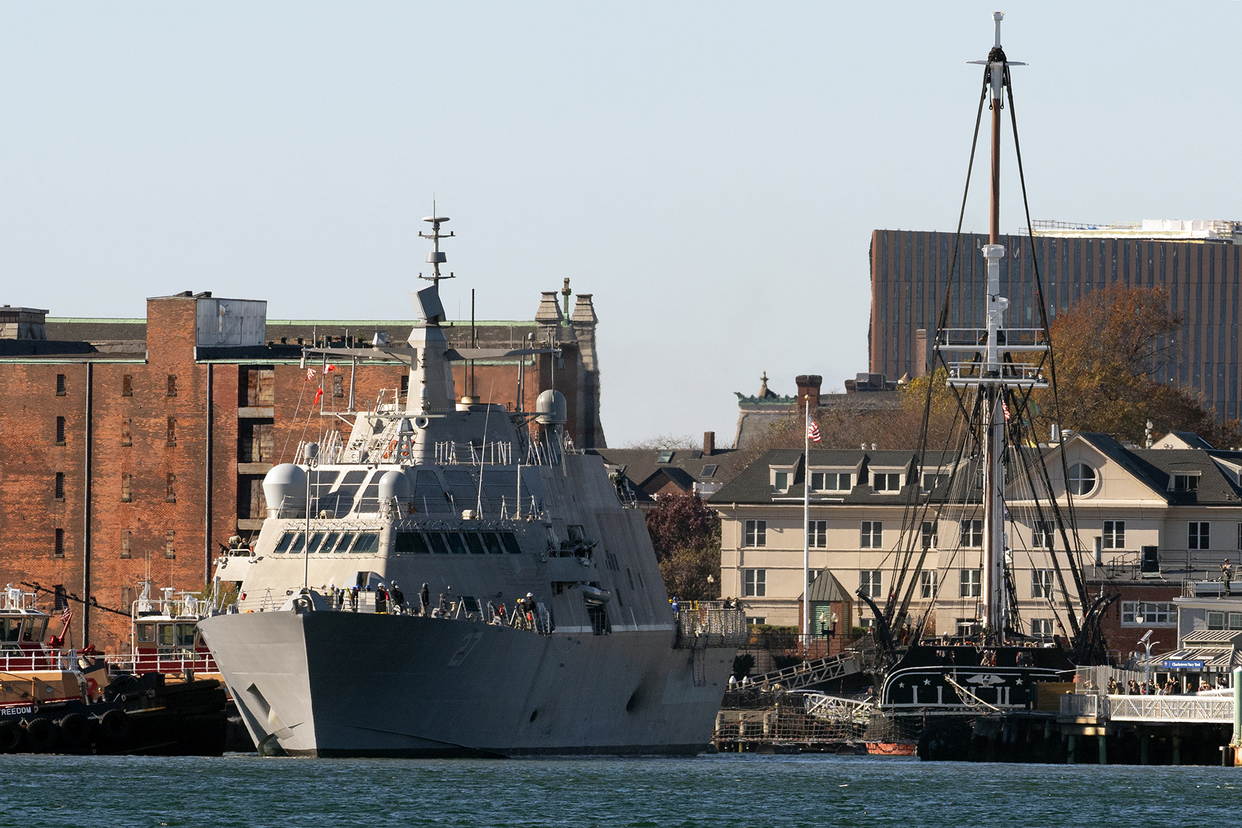 The Freedom-class littoral combat ship USS Nantucket (LCS 27) pulls in beside the USS Constitution in Boston, Mass. Nov. 8, 2024. USS Nantucket will be commissioned Nov. 16. (DoD photo by EJ Hersom)