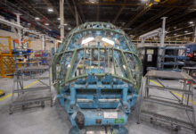 A sneak peak at the first C-130J-30 Super Hercules aircraft being built by Lockheed Martin Corp. for the U.S. Navy’s E-130J program. This aircraft – the first of three – is slated to be delivered to the government in 2026 for modification into an E-130J Engineering Development Model (EMD). The E-130J, formerly called E-XX, will be the successor to the E-6B Mercury for the Take Charge and Move Out (TACAMO) mission, which connects the president, secretary of defense and U.S. Strategic Command with the United States’ nuclear triad. The U.S. Navy’s Airborne Strategic Command, Control and Communications Program Office (PMA-271) is leading the TACAMO Recapitalization Program and is scheduled to award the EMD contract during the first quarter of the 2025 fiscal year. (Photo by David L. Key, Lockheed Martin)