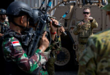 Australian Army soldier instructs Indonesian National Armed Forces personnel on using the EF88 Austeyr rifle during Exercise Keris Woomera 2024.