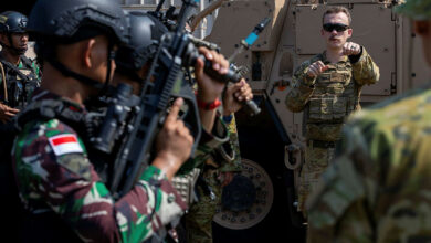 Australian Army soldier instructs Indonesian National Armed Forces personnel on using the EF88 Austeyr rifle during Exercise Keris Woomera 2024.