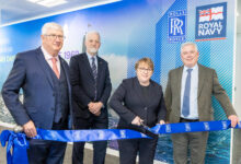 Rolls-Royce and UK Ministry of Defence leaders cut ribbon of a a submarine support office in Glasgow