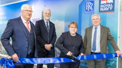 Rolls-Royce and UK Ministry of Defence leaders cut ribbon of a a submarine support office in Glasgow