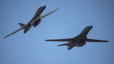 Two U.S. Air Force B-1B Lancers assigned to the 34th Expeditionary Bomb Squadron, Ellsworth Air Force Base, South Dakota, fly by Royal Australian Air Force Base Darwin, Northern Territory, Australia, before landing for fuel on June 22, 2022. Bomber Task Force missions contribute to joint force lethality and deter aggression in the Indo-Pacific by demonstrating United States Air Force ability to operate anywhere in the world at any time in support of the National Defense Strategy. (U.S. Air Force Photo by Tech.Sgt. Chris Hibben)