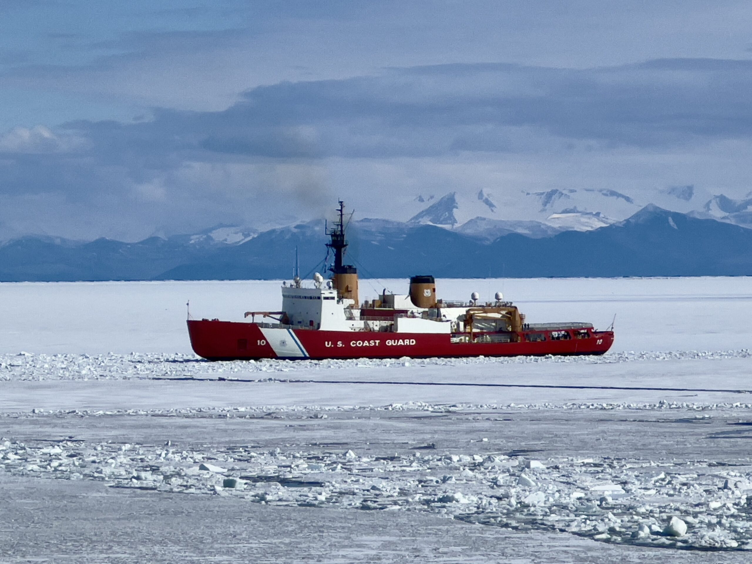 230118-N-NX070-1001 The heavy ice breaker USCGC Polar Star (WAGB 10) breaks ice approaching McMurdo Station, Antarctica. Joint Task Force-Support Forces Antarctica oversees the activities of the joint services and provides Department of Defense support to the National Science Foundation and United States Antarctic Program through Operation Deep Freeze. (U.S. Navy photo by Senior Chief Mass Communication Specialist RJ Stratchko)