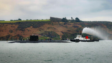 HMS Triumph, the last of the Trafalgar Class submarines still in service has arrived at HMNB Devonport for the last time before her decommissioning. The Boat gracefully transited across Plymouth Sound escorted by tugs boats and following-on craft from the Naval Base, after travelling down from HMNB Clyde submarine base in Scotland, where she had been operating from. HMS Triumph was laid down at Barrow Shipyard in February 1987 and commissioned less than five years later in October 1991, the last of the seven Trafalgar class submarines constructed for the Royal Navy. The current HMS Triumph is the tenth vessel and the second submarine to bear the name. The first Triumph was a 68-gun galleon built in 1561, and was the largest Ship built in England during the reign of Queen Elizabeth the first. A square-rigged galleon of four masts, she served as the flagship of Admiral Frobisher during the battles of the Spanish Amarda.