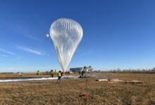 Experts preparing a stratospheric balloon for flight