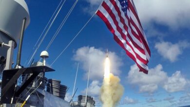 The Arleigh Burke-class guided-missile destroyer USS Barry (DDG 52) launches a Standard Missile (SM) 2 during a live-fire missile exercise