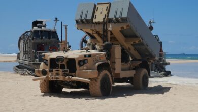 KAUAI, Hawaii - A Navy Marine Expeditionary Ship Interdiction System launcher deploys into position aboard Pacific Missile Range Facility Barking Sands, Hawaii, Aug. 16, 2021.