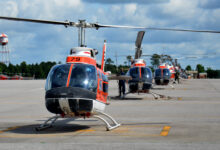 A row of TH-57 Sea Ranger helicopters waits on the runway at Naval Air Station Whiting Field, June 9, 2014. During the advanced flight training phase of a two-year-long flight school course, future Coast Guard pilots train for 7-8 months in the TH-57, learning aircraft systems and avionics, routine and emergency procedures, flight planning, risk management techniques, and earning their instrument rating, which allows them to fly in clouds and restricted visibility.