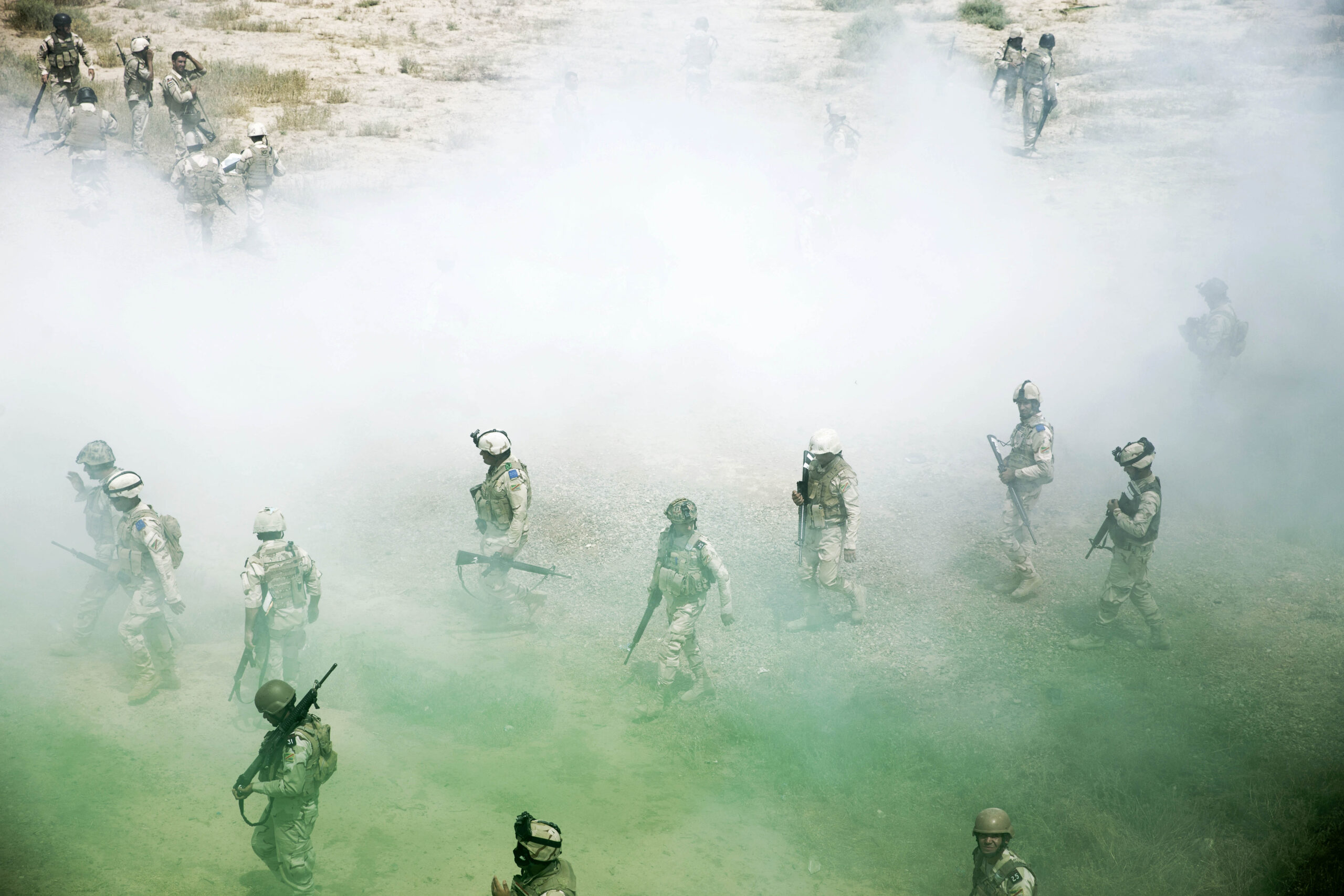 Iraqi Army soldiers walk off the range after completing a day's training during a Junior Leaders Course conducted by New Zealand Army personnel at the Taji Military Complex in Iraq. *** Local Caption *** New Zealand Army trainers from Task Group Taji have delivered eight weeks of instruction to Iraqi Army soldiers at the Taji Military Complex in Iraq. The Iraqi soldiers were participating in the Iraqi Army Non-Commissioned Academys Junior Leaders Course.

The training packages included sessions of combat first aid, navigation, physical training, marksmanship and urban operations.

Members of the Iraqi Army are being trained by Task Group Taji personnel from Australia and New Zealand at the Taji Military Complex in Iraq as part of the broader international Building Partner Capacity (BPC) mission. The training includes weapons handling, building clearances and obstacle breaching techniques, as well as training in the tactics, techniques and procedures for squad through to company-level operations for use in the fight against Daesh. 

Task Group Tajis BPC contribution is part of Australias broader Defence contribution to Iraq, codenamed Operation OKRA, which includes a Special Operations Task Group and an Air Task Group.