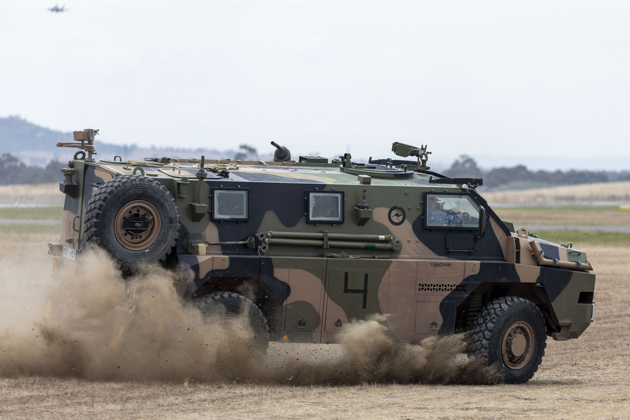 A No. 1 Security Forces Squadron Bushmaster Protected Mobility Vehicle extracts security detail personnel during a demonstration at the 2023 Avalon International Airshow. *** Local Caption *** The Australian International Airshow (AIA)  a biennial activity coordinated and run by the AMDA Foundation with the Royal Australian Air Force, other government agencies and non-government elements in support  is the premier showcase in the southern hemisphere for military aviation and the aerospace industry. The Australian International Airshow 2023 and associated activities are conducted at Avalon Airport and select Melbourne CBD locations over the period 24 February  5 March 2023. The Trade and Defence Exposition is conducted between 28 February and 3 March 2023, followed by the public air show between 3 and 5 March. AIA23 is the capstone engagement activity for Air Force after a four-year hiatus due to the COVID-related cancellation of AIA21. AIA23 shows the ADFs current capabilities and future concepts in a collaborative and integrated manner to Government, military allies and partners, defence industry, and the Australian public.