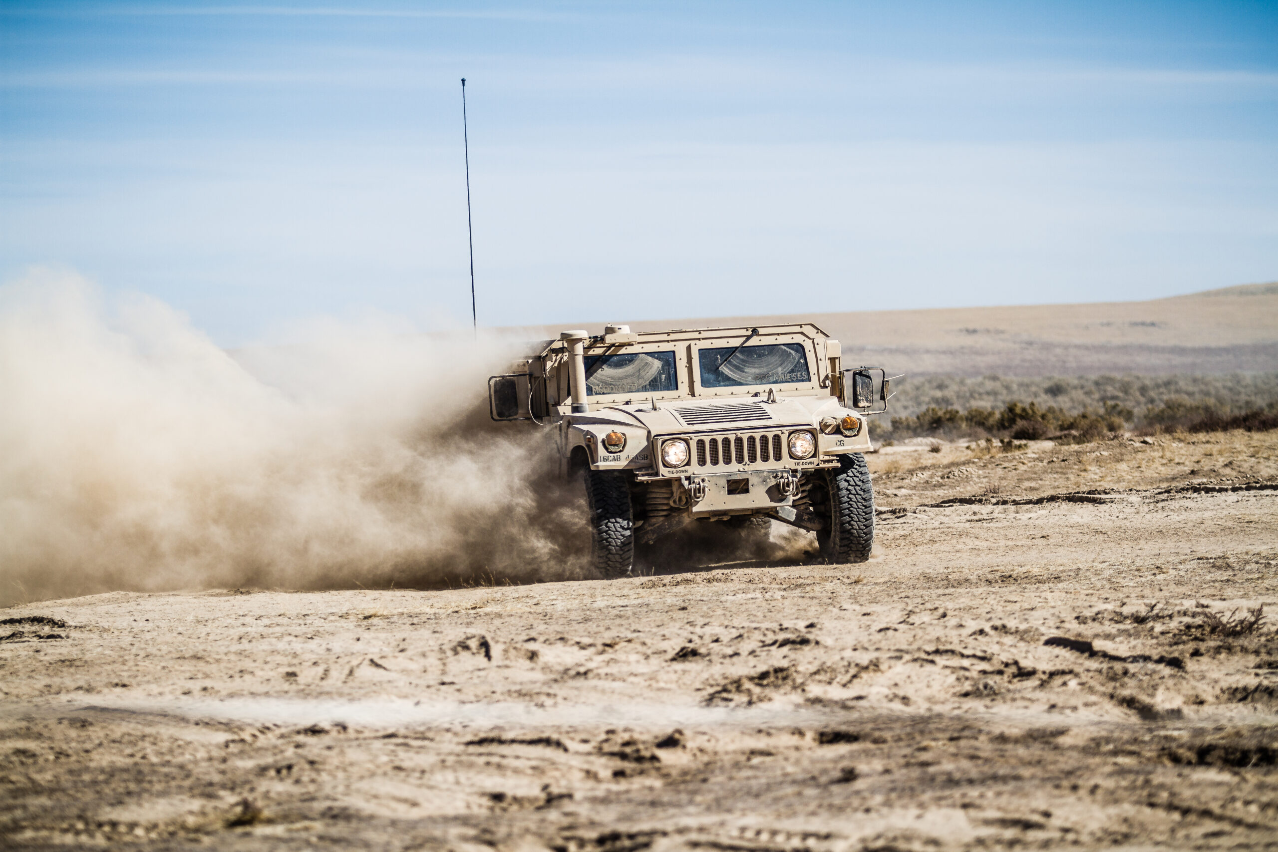 U.S. Army Soldiers assigned to 16th Combat Aviation Brigade drive a HUMVEE through dusty terrain at Orchard Combat Training Center, Idaho, Oct. 8, 2016. Over 1,000 soldiers from 7th Infantry Division are participating in Raptor Fury, an exercise to validate 16th CAB's mission readiness.