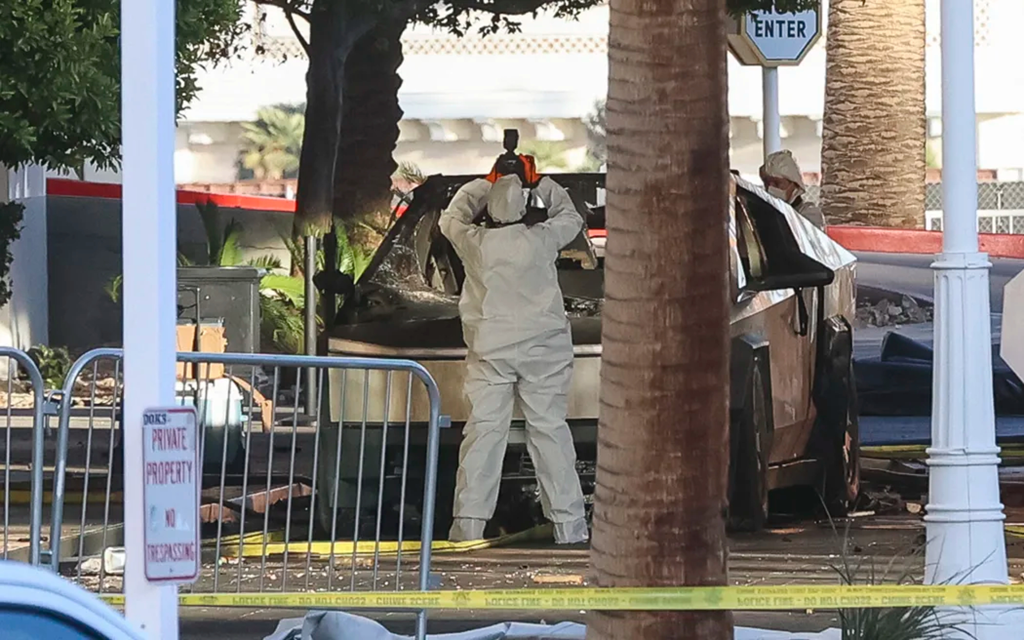 An investigator photographs a Tesla Cybertruck that exploded outside the lobby of the Trump hotel in Las Vegas. Photo: WADE VANDERVORT/AFP