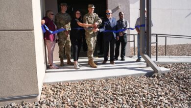 Col. Jeremy Raley, director of the Air Force Research Laboratory’s Space Vehicles Directorate, cuts a ceremonial ribbon in front of the new Radiation Tolerance Research on Electronics for Space and Strategic Systems, or FORTRESS, facility doors Aug. 20, 2024, at Kirtland Air Force Base, N.M. The ceremony commemorated the opening of the new building. FORTRESS will be used for developing new electronic components in space. (U.S. Air Force photo / Paul Robinson)