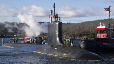 The pre-commissioning unit (PCU) Iowa (SSN 797) arrives for the first time at Naval Submarine Base New London in Groton, Connecticut, December 19, 2024. The future USS Iowa was delivered to Submarine Squadron (SUBRON) 4 from General Dynamics Electric Boat shipbuilding facility down river after recently completing a series of at-sea testing. The fast-attack submarine PCU Iowa and crew operate under SUBRON 4 and its primary mission is to provide fast-attack submarines that are ready, prepared, and committed to meet the unique challenges of undersea combat and deployed operations in unforgiving environments across the globe. (U.S. Navy photo by John Narewski)