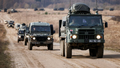 A line of Land Rover Wolf 4x4 Utility vehicles follow a Pinzgauer 6x6 All Terrain Truck on the Drawsko Pomorskie Training Area (DPTA) for Exercise Steadfast Defender 2024. Approximately 400-500 military vehicles and 1500 military personnel taking part in Ex STEADFAST DEFENDER line up on DPTA, Poland, for a Battle Group photo. 16,000 British soldiers are taking part in the largest set of NATO multi-national military manoeuvres in generation. Exercise Steadfast Defender will see these troops deploy across the entirety of Europe’s eastern flank, stretching from the far north of Norway, inside the Arctic Circle, all the way down to Georgia in the Caucasus’s. The British Army will be at the very forefront over the 5-month duration of Exercise Steadfast Defender, underpinning its position not only as the leading NATO European member state, but also one of its most potent. To put that into perspective; the Army is committing a 3* Headquarters, as well as two 2* Divisional and three 1* Combat Brigade Headquarters. These deployed formations will test, evaluate, and prove our ability to integrate and operate alongside our partners and allies, strengthening that collective and sustained commitment to European security. Along with those 16,000 troops, the UK will be sending massed armour including main battle tanks across to Europe aboard Ro-Ro vessels and loaded onto trains through the Channel Tunnel. Paratroopers will fly in from UK bases to seize strategic objectives and link up with NATO allied forces. Exercise Steadfast Defender will run from January through to May and comprise of 11 individual exercises in which British forces will participate alongside our NATO allies and partners.