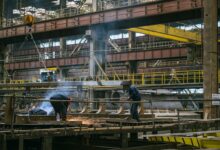 Workers laying the keel for the Belgian Navy's Liege mine countermeasures vessel