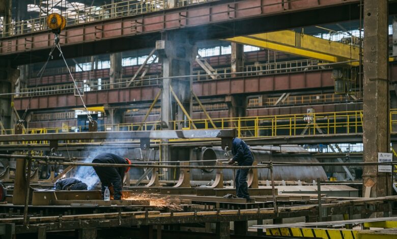 Workers laying the keel for the Belgian Navy's Liege mine countermeasures vessel