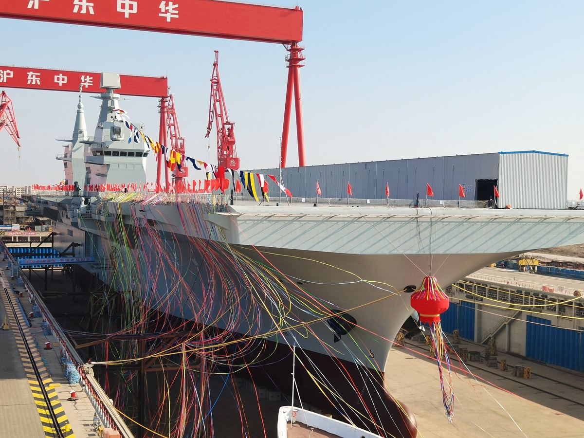 China's launching of its latest and largest amphibious assault vessel, the Sichuan