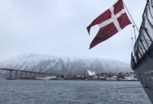 The Niels Juel at the quay in the north-Norway town of Tromsø, the characteristic Arctic Cathedral can be seen in the background