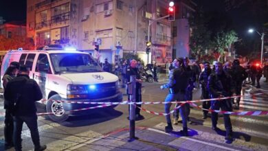 Members of Israeli security forces stand guard at the site of a stabbing attack in Tel Aviv. (Jack Guez/AFP)