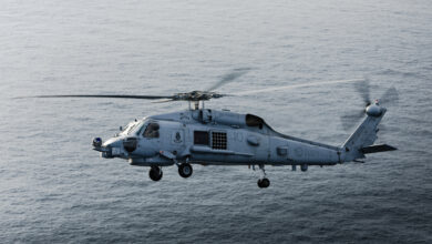 Royal Australian Navy replenishment ship HMAS Stalwarts embarked MH-60R Seahawk helicopter Boomerang conducts flying operations during a transit as part of a regional presence deployment. *** Local Caption *** The Royal Australian Navy is undertaking a regional presence deployment in Southeast and Northeast Asia. During the deployment, HMA Ships Toowoomba, Stalwart and Brisbane demonstrated the Royal Australian Navys ability to execute sustained operations in the deployed environments through superior Replenishment at Sea capability. During this evolution, Stalwart completing her first dual Replenishment at Sea evolution providing HMA Ships Toowoomba and Brisbane with F76 fuel, and F44 fuel for the embarked MH-60R Helicopters. Concurrently, Stalwart launched her embarked MH-60R helicopter, Boomerang, to conduct a Vertical Replenishment of stores and mission-essential equipment to Toowoomba. Regional presence deployments demonstrate Australias commitment to, and engagement with, the region. The deployments play a vital role in Australias long-term security and prosperity by protecting Australias interests, preserving a rules-based order, enhancing cooperation and relationships with regional partners and allies, and developing capability and interoperability.