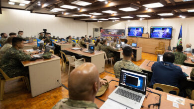 U.S. and Philippine service members with the Cyber Defense Exercise attend their final classroom lecture during exercise Balikatan 23 at Camp Aguinaldo, Philippines, April 14, 2023. Balikatan 2023, the 38th iteration of the annual bilateral exercise between the Armed Forces of the Philippines and the U.S. military, featured an inaugural joint, bilateral cyber defense exercise. Five teams of cyber defense experts defended a simulated military network, critical civilian infrastructure and other digital nodes from simulated malign actors such as criminal gangs, hacker collectives and a fictitious nation-state. Balikatan provides a venue to modernize the U.S. Philippine Defense Alliance, and improve collective capabilities and interoperability. (U.S. Marine Corps photo by Cpl. Fred Garcia)