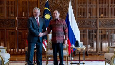 Russian Security Council Secretary Sergei Shoigu shaking hands with Malaysian Prime Minister Anwar Ibrahim during a courtesy call.