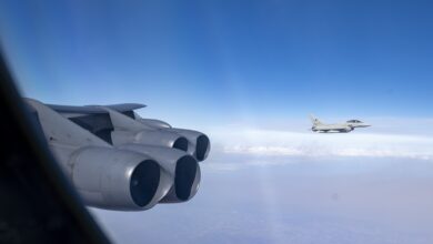 A Eurofighter Typhoon flies alongside a B-52H Stratofortress aircraft during bomber task force mission SPARTAN MACE.