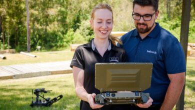 Representatives from Babcock and EPE operate the Squad Packable Utility Robots (SPUR) Remote Positioning Vehicles – Light