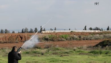 An operator using the hand-held net gun of the DefendAir C-UAS.
