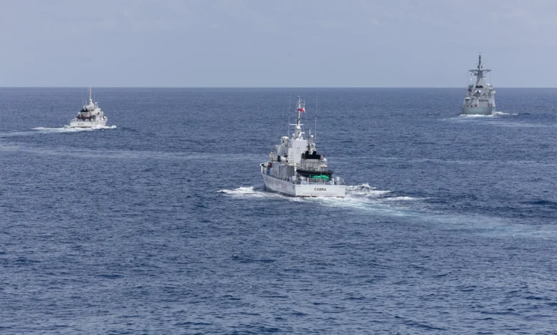 Philippine Coast Guard patrol vessels BRP Suluan and BRP Cabra sail with Philippine Navy frigate BRP Miguel Malvar and USS Curtis Wilbur during a joint maritime activity in the South China Sea, July 16, 2025.