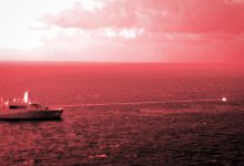 211214-M-HB658-1322 GULF OF ADEN (Dec. 14, 2021) Amphibious transport dock ship USS Portland (LPD 27) conducts a high-energy laser weapon system demonstration on a static surface training target, Dec. 14, while sailing in the Gulf of Aden. During the demonstration, the Solid State Laser – Technology Maturation Laser Weapons System Demonstrator Mark 2 MOD 0 aboard Portland successfully engaged the training target. The photograph was captured utilizing a short wave infrared lens and optical filter. (U.S. Marine Corps photo by Staff Sgt. Donald Holbert)