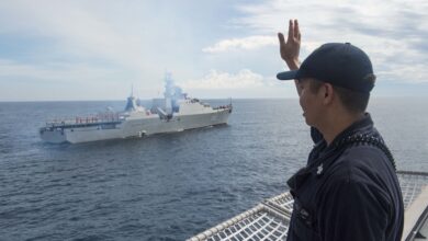 170710-N-PD309-206 SOUTH CHINA SEA (July 10, 2017) Gas Turbine System Technician (Mechanical) 1st Class Genesis Sulit waves to Vietnamese Gepard-class frigate Ly Thai To (HQ 012) aboard littoral combat ship USS Coronado (LCS 4) during a passing exercise as part of Naval Engagement Activity (NEA) Vietnam 2017. The engagement provides an opportunity for Sailors from the U.S. Navy and Vietnam People's Navy to interact and share knowledge to enhance mutual capabilities and strengthen solid partnerships. (U.S. Navy photo by Mass Communication Specialist 3rd Class Deven Leigh Ellis/Released)