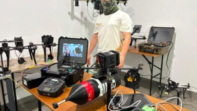Personnel displaying tactical unmanned aerial systems for an online demonstration. Photo: Brave1