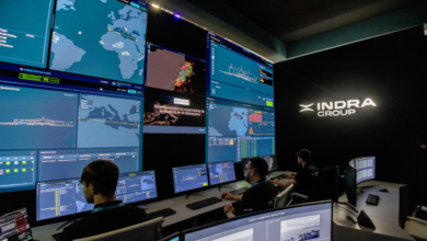 Indra personnel monitor operational data across multiple displays at an Indra command and control facility. Image: Indra Group