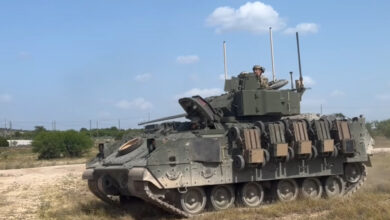 A Bradley infantry fighting vehicle mounted with FireAnt ground drones. Photo: Swarmbotics AI