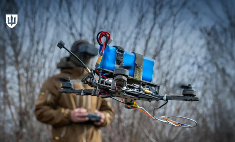 Ukrainian FPV drone operator holding a quadcopter during combat preparation. Photo: Ministry of Defence of Ukraine