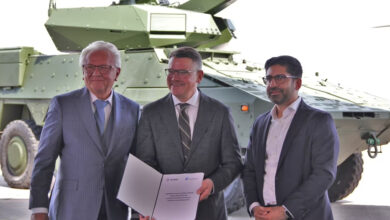 Rheinmetall and German state officials during the signing of plans to build a new logistic center at Kassel Airport.