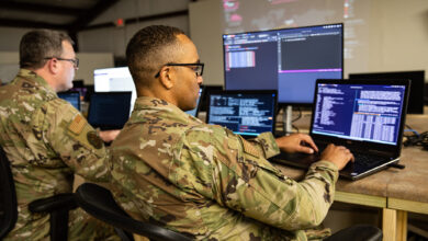 US service members work at computer stations. Photo: Pentagon