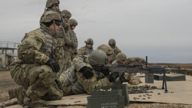 Giving guidance on correcting his aim, Staff Sgt. Tyler Hunter shouts directions to Spc. Timothy Martin as he fires the M240 machine gun. Sgt. Randy Torrecer provides support for Martin. The last week of training begins on a cold rain swept day trip to the Orchard Combat Training Center. The scout trainees will take turns driving a Bradley Fighting Vehicle. On the range the trainees will fire the Mark 19 machine grenade launcher, the 50 Cal. Machine gun and the 240B machine gun. During the remainder of the week, they learn how to boresight the 25mm gun; the fundamentals of reconnaissance and security; how to establish an observation post; and how to handle and detonate explosives. U.S. Army Cavalry Scouts act as the eyes and ears on the field, gathering information about enemy positions, vehicles, weapons, and activity. The scouts often operate in small groups gathering intelligence. With the information they gather, commanders can make informed decisions about how to move troops and where and when to attack. Their scouting duties include conducting mounted and dismounted navigation, collecting data about tunnels and bridges, and serving as members of observation and listening posts. In addition to basic soldiering skills, cavalry scouts learn to secure and prepare ammunition on scout vehicles, load, clear and fire individual and crew-served weapons.