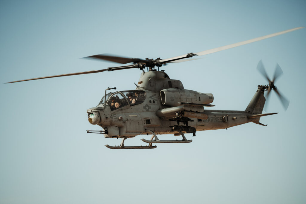 A U.S. Marine Corps AH-1Z Viper assigned to Marine Light Attack Helicopter Squadron (HMLA) 367, Marine Aircraft Group 39, 3rd Marine Aircraft Wing, flies during close air support drills as part of Service Level Training Exercise 4-25 at Marine Corps Air Ground Combat Center, Twentynine Palms, California, July 26, 2025. MCAGCC serves as the Marine Corps’ premier training venue for service-level exercises by providing realistic multi-domain environments to prepare forces for success in future conflicts. (U.S. Marine Corps photo by Lance Cpl. Micah Thompson)