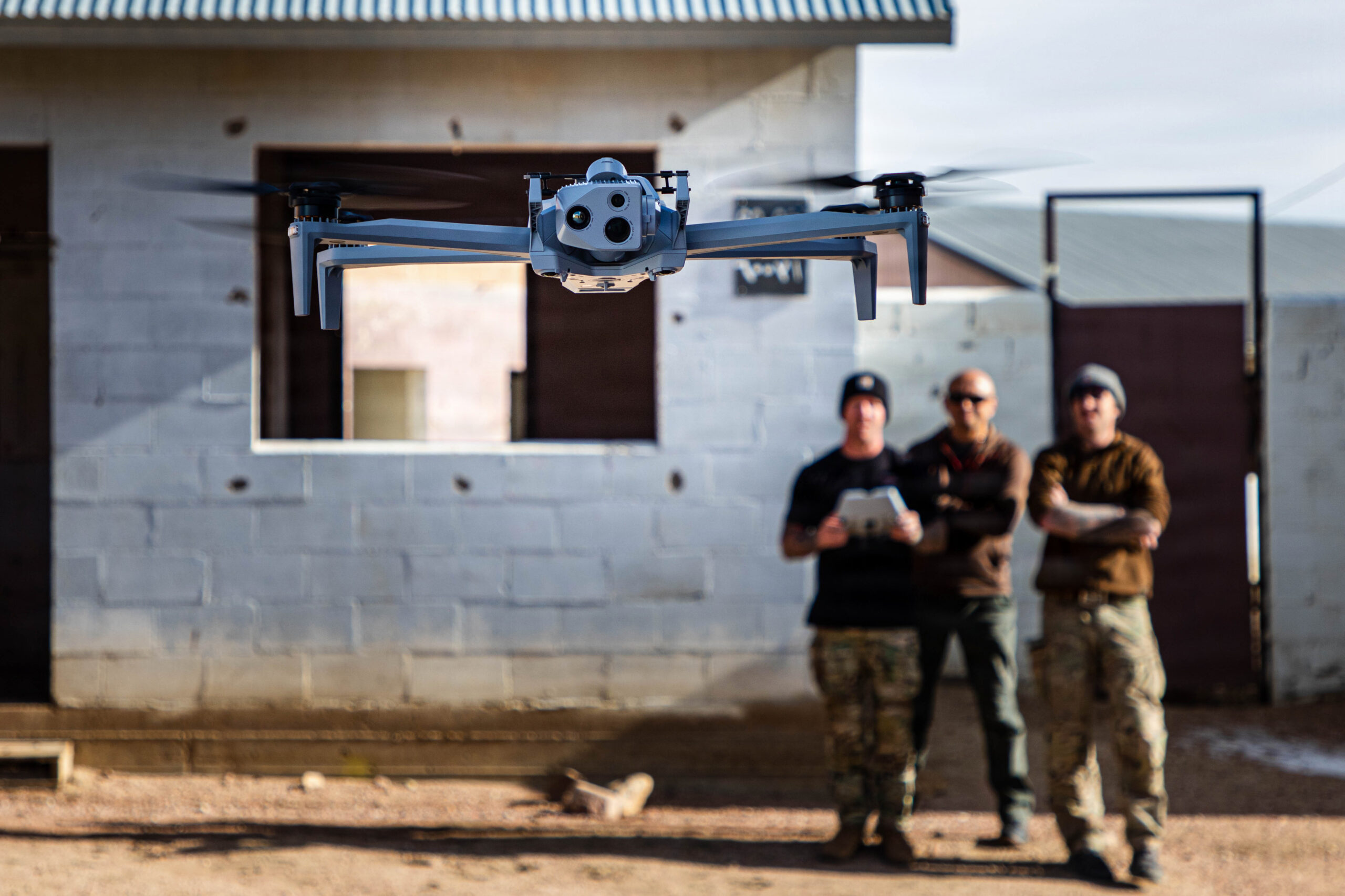 A Green Beret assigned to 4th Battalion, 10th Special Forces Group (Airborne) demonstrates the operation of an unmanned aerial system during a drone course at Fort Carson, Colorado, Dec. 2, 2025. The training enhances operators’ understanding of drone capabilities and mission integration, improving the unit’s ability to employ unmanned systems in complex operational environments. (U.S. Army photo by Sgt. Zachary Myers)