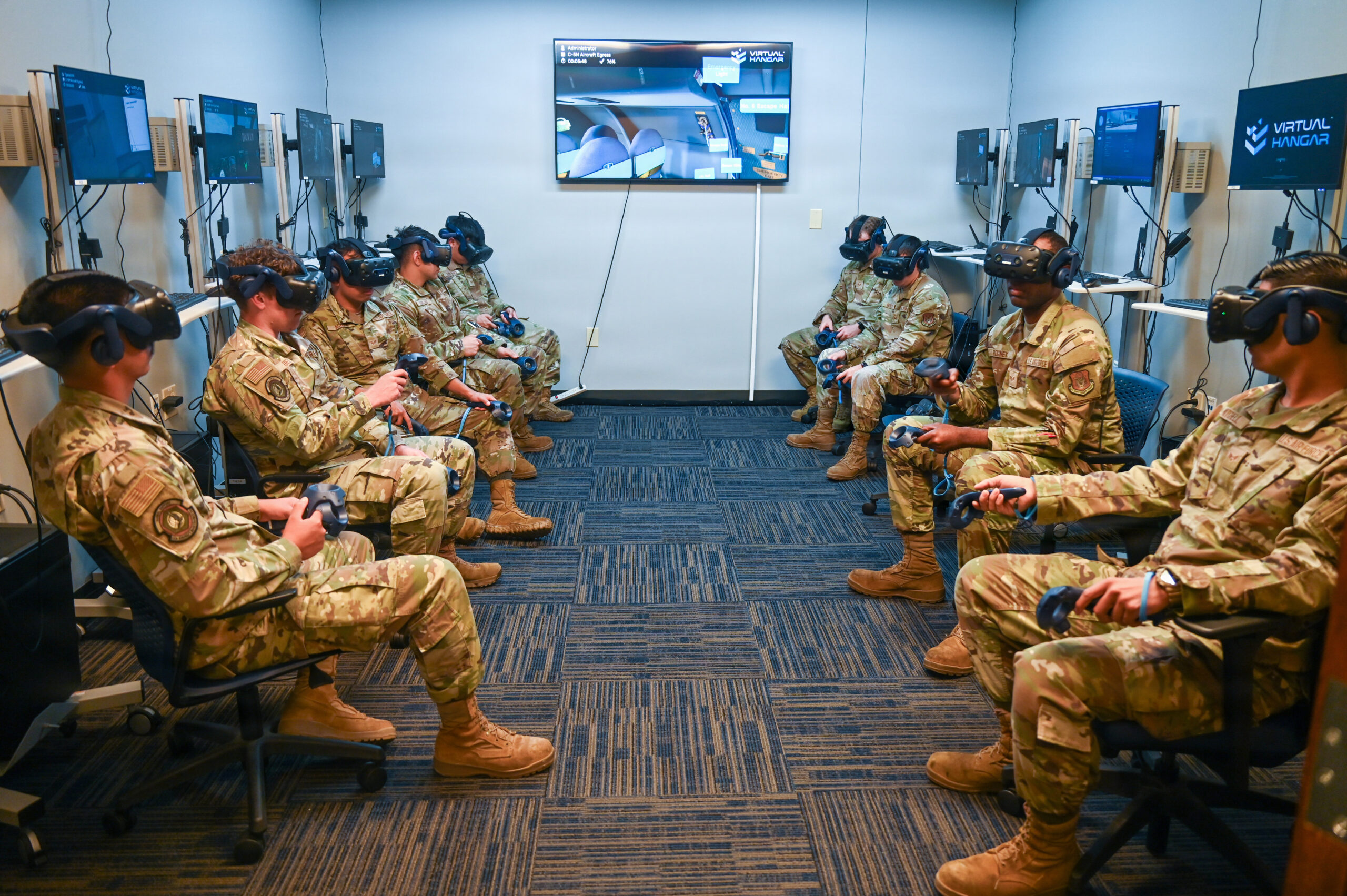 433rd Aircraft Maintenance Squadron Citizen Airmen engage with various virtual reality maintenance training scenarios at Joint Base San Antonio-Lackland, Texas, Aug. 10, 2026. The 433rd Maintenance Group is leveraging VR technology to run its Maintenance Qualification Training Program, allowing maintainers to hone their skills in a digital space while reducing costs and demands on the C-5M Super Galaxy fleet. (U.S. Air Force photo by Julian Hernandez)