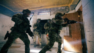 Green Berets assigned to 1st Special Forces Group (Airborne) enter a room during close-quarters battle training at Joint Base Lewis-McChord, Washington, Sept. 16, 2026. The exercise replicated realistic operational conditions, allowing Soldiers to refine close-quarters tactics, communication, and team coordination in preparation for real-world missions. 1st SFG(A) maintains highly lethal, rapidly deployable forces to execute the full spectrum of special operations alongside allies, partners, and the joint force as the preferred partner and premier special operations entity in the U.S. Pacific Command area of responsibility. (U.S. Army photo by Staff Sgt. John Bae) This photo was altered for security purposes in accordance with USSOCOM Manual 360-1.